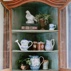 Decorating Shelves in a Corner Cabinet